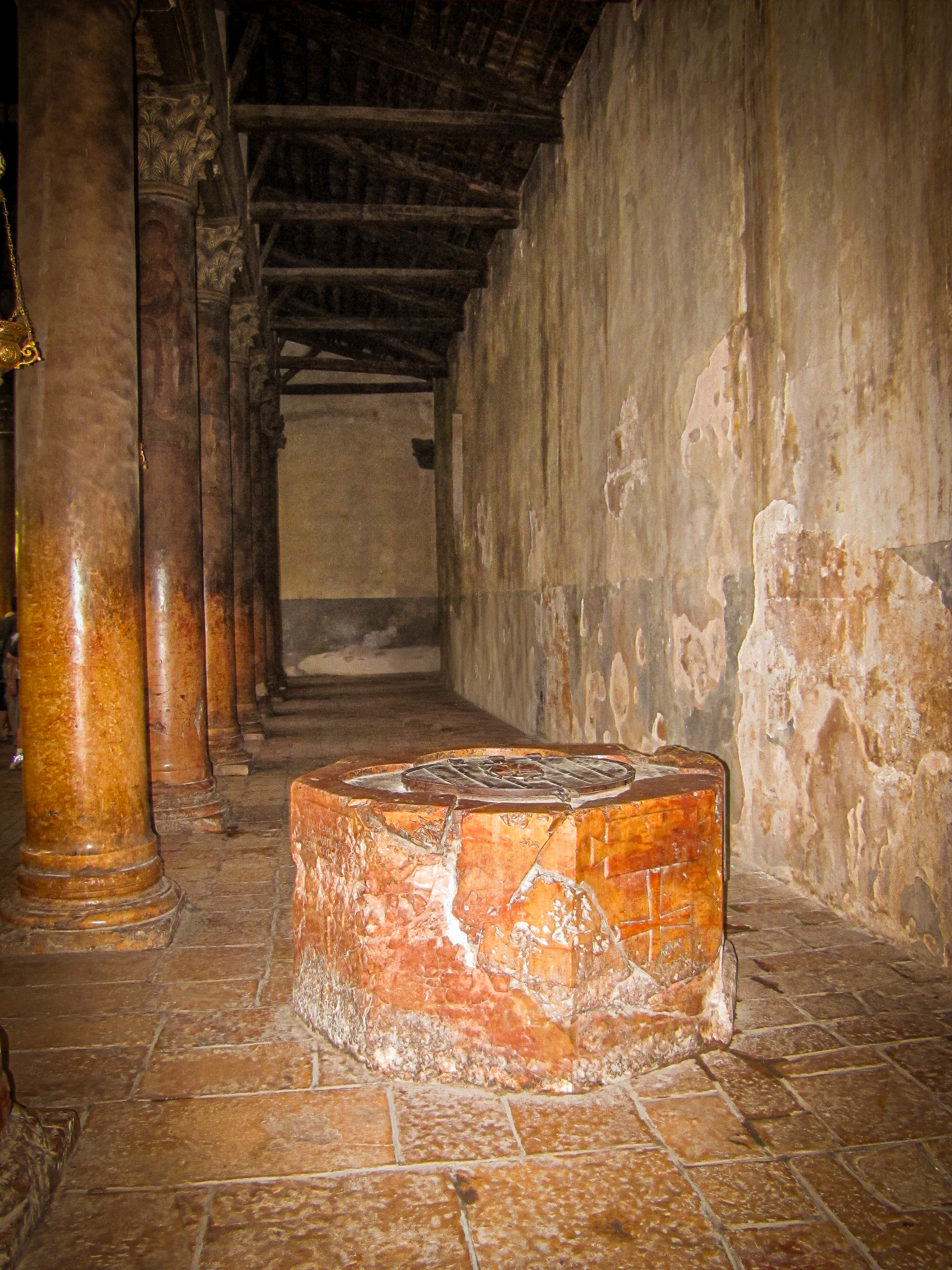 Baptismal Font of 540 AD with Marble Columns from 1169 AD in Bethlehem's Church of the Nativity 